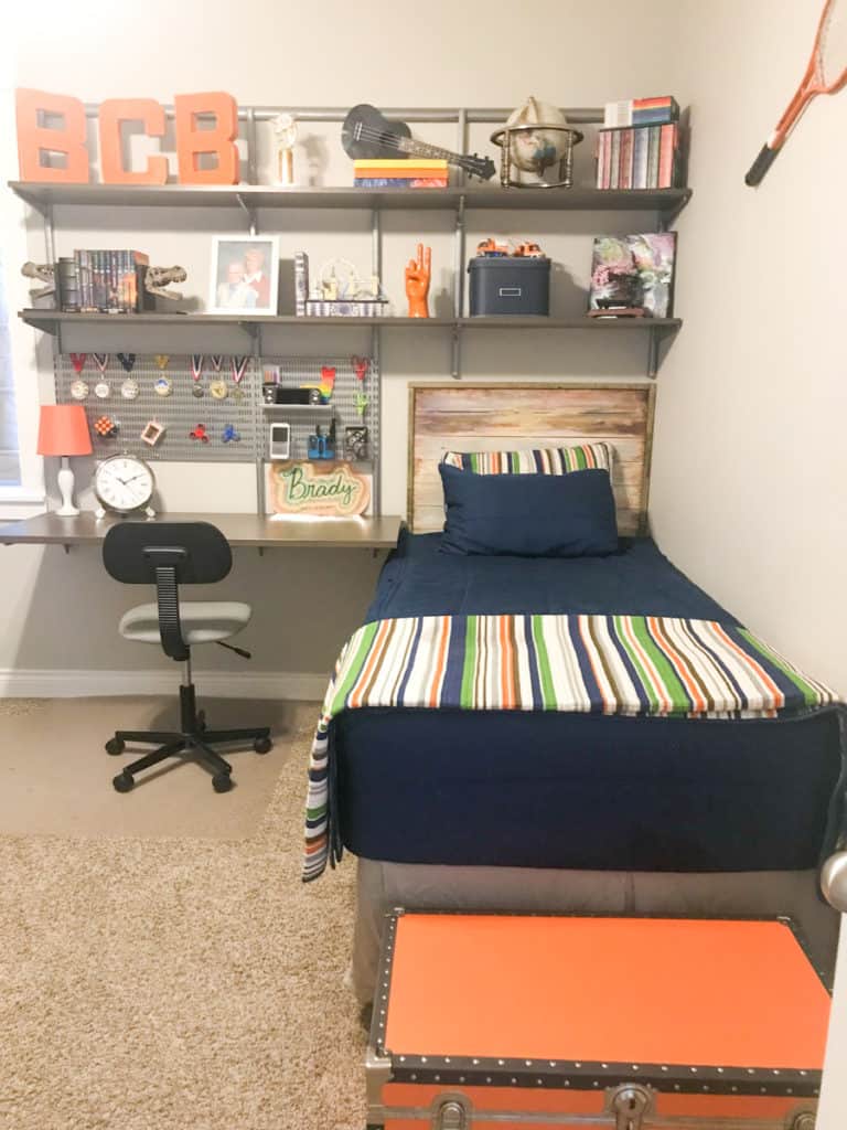 Organizing a kid's bedroom using lots of storage products