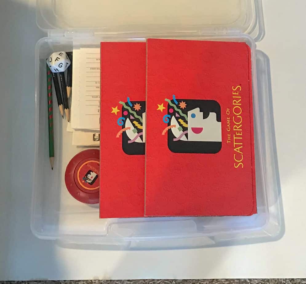 Scattegories game organized in plastic document box.