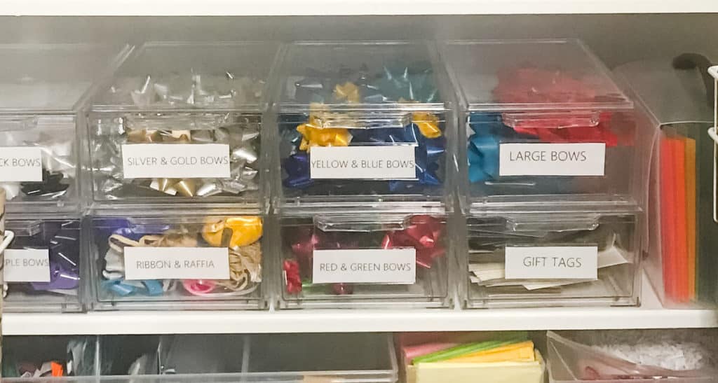 Colorful gift bows neatly organized in acrylic drawers