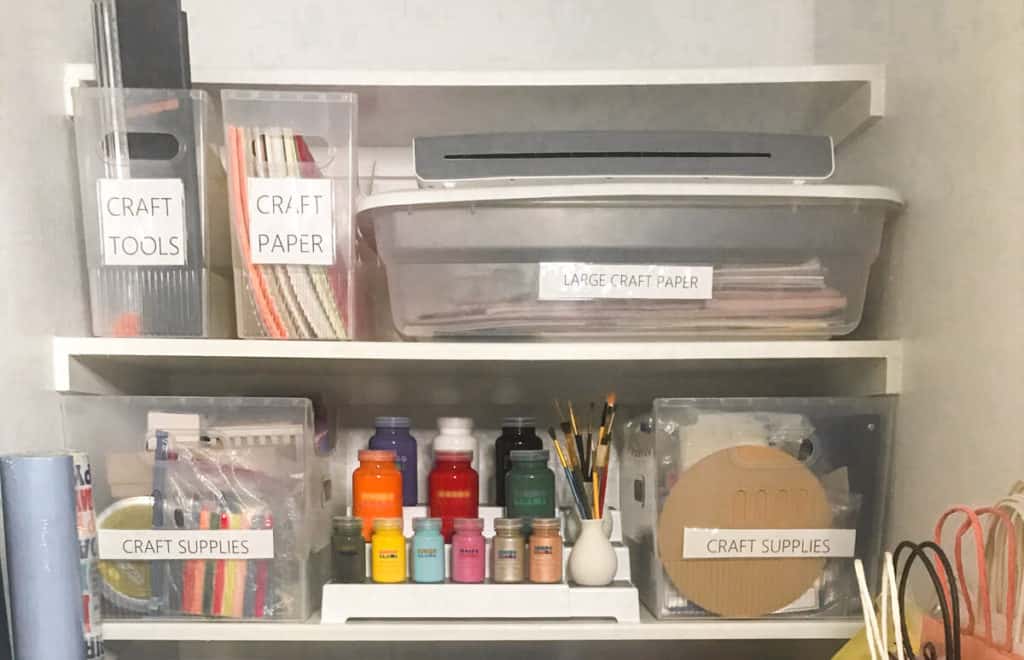 2 shelves used for organizing craft supplies