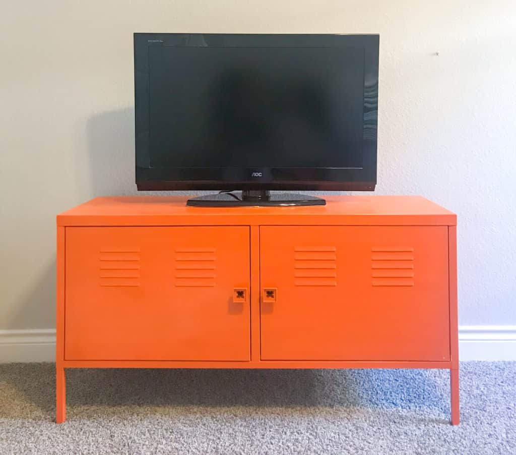 Orange locker cabinet for organizing gaming equipment