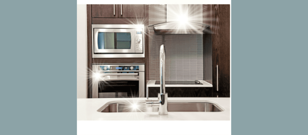A very clean kitchen with sparkling appliances