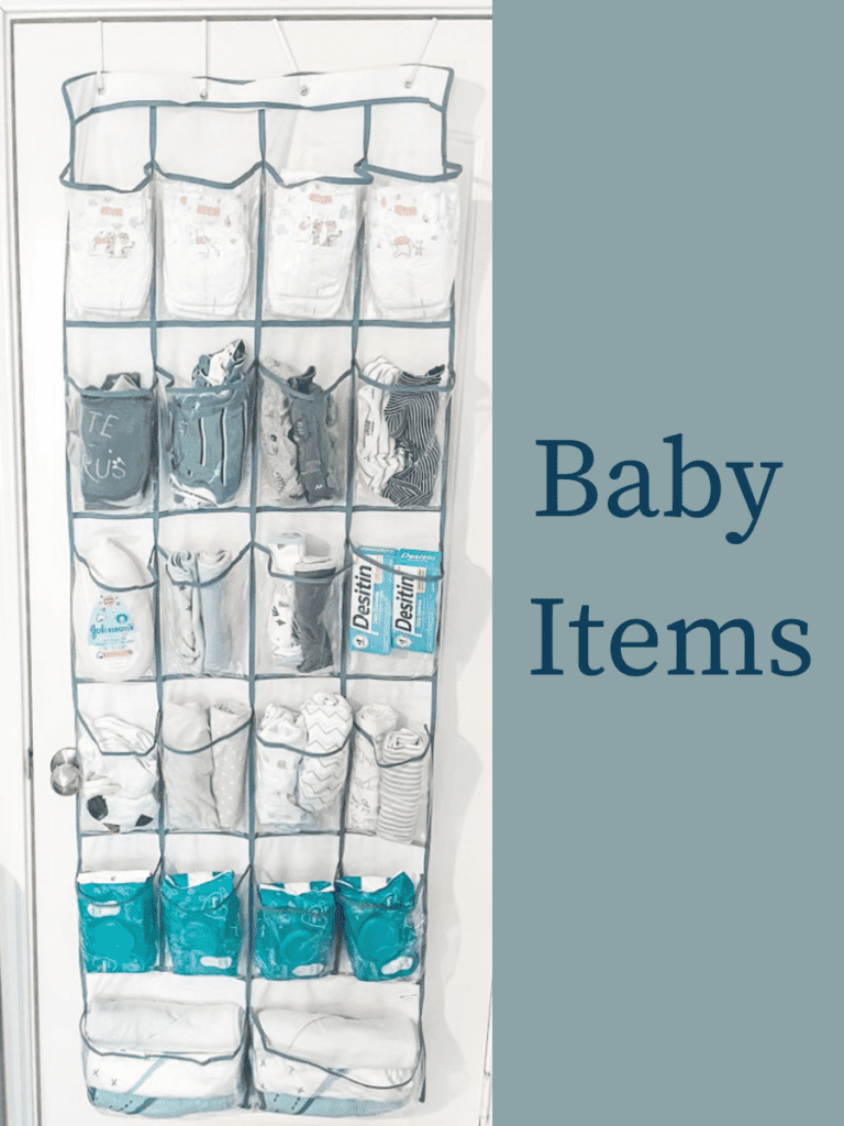 An over-the-door shoe organizer with each pocket filled with nursery/baby items