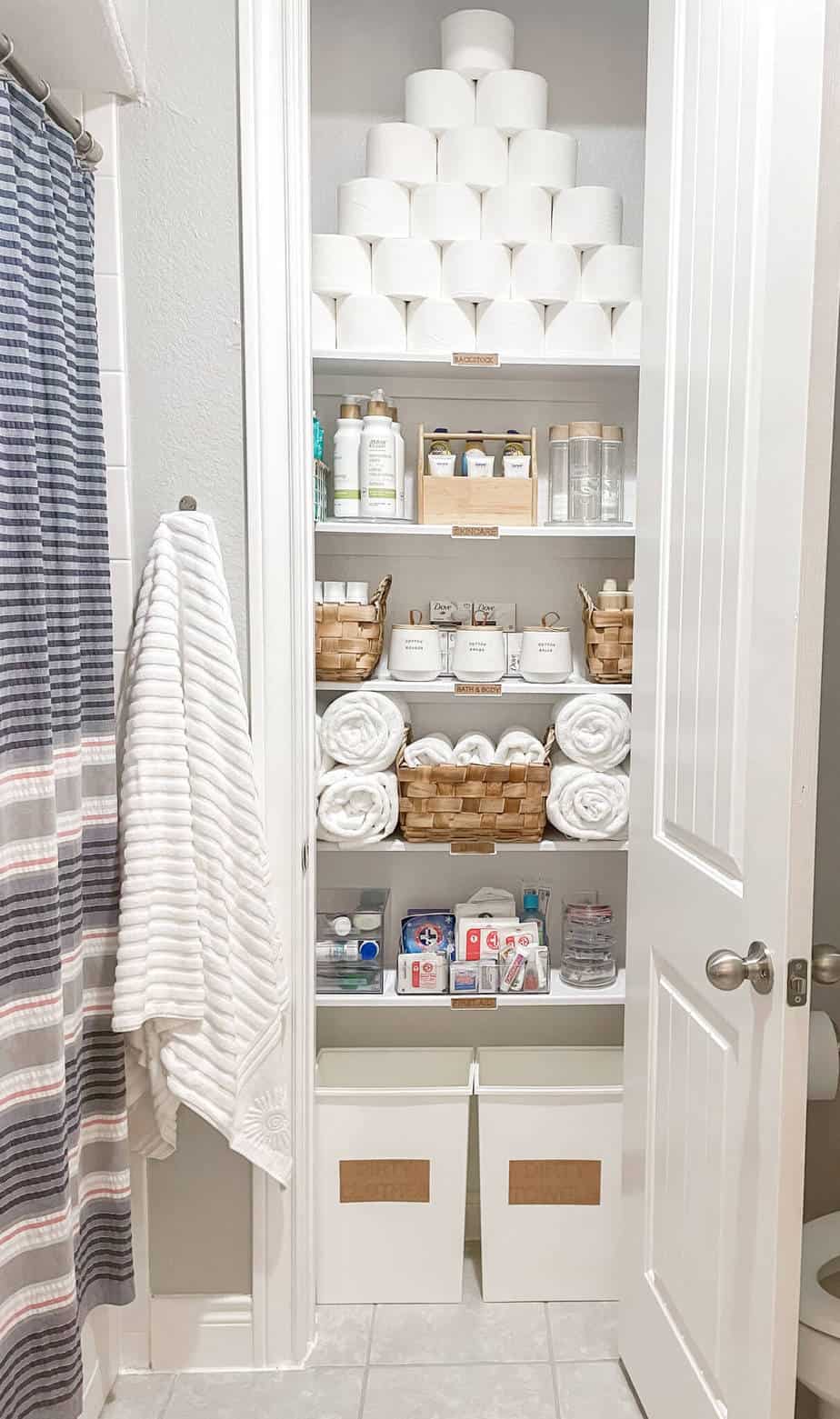 An extremely organized bathroom storage closet